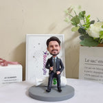 Personalized Bobblehead in Suit Sitting on Money Bag