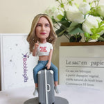 Custom Bobblehead Sitting On a Suitcase
